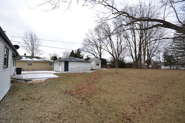 view of yard with a patio area and a shed