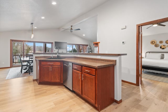 kitchen with vaulted ceiling with beams, dishwasher, plenty of natural light, and sink