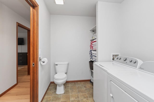 washroom with washer and clothes dryer