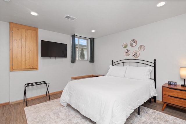 bedroom featuring hardwood / wood-style flooring