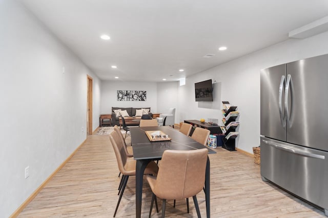 dining area featuring light hardwood / wood-style flooring