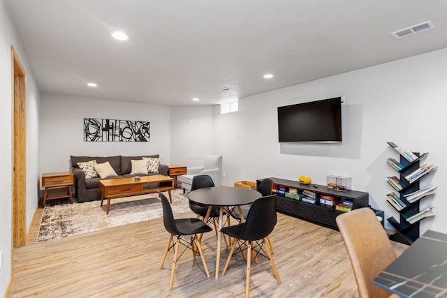 dining area with light wood-type flooring