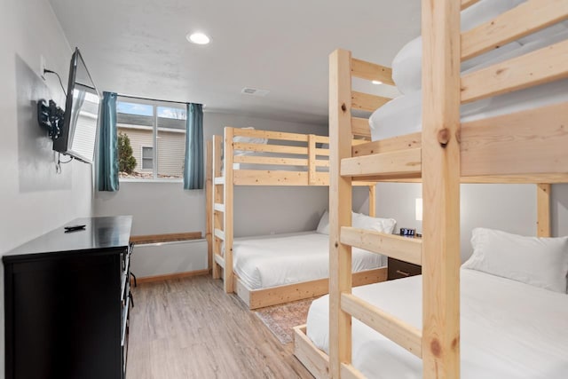 bedroom featuring light hardwood / wood-style floors