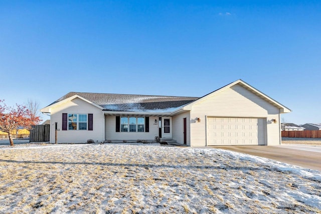 ranch-style home featuring a garage