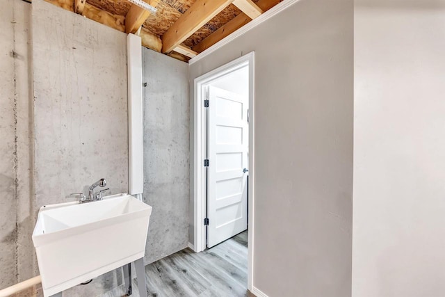 bathroom featuring hardwood / wood-style floors and sink