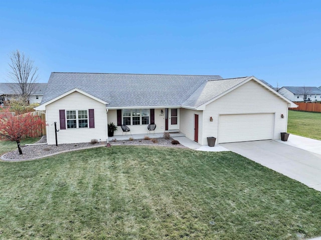 ranch-style house featuring a front lawn and a garage