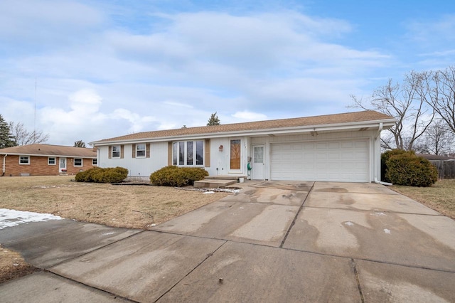 ranch-style house featuring a garage