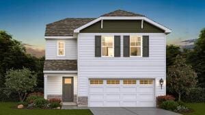 view of front of home with a garage