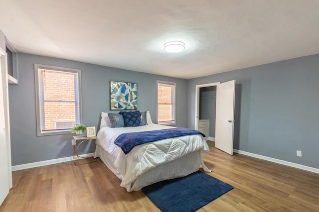 bedroom featuring wood-type flooring