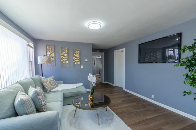 living room featuring dark hardwood / wood-style flooring