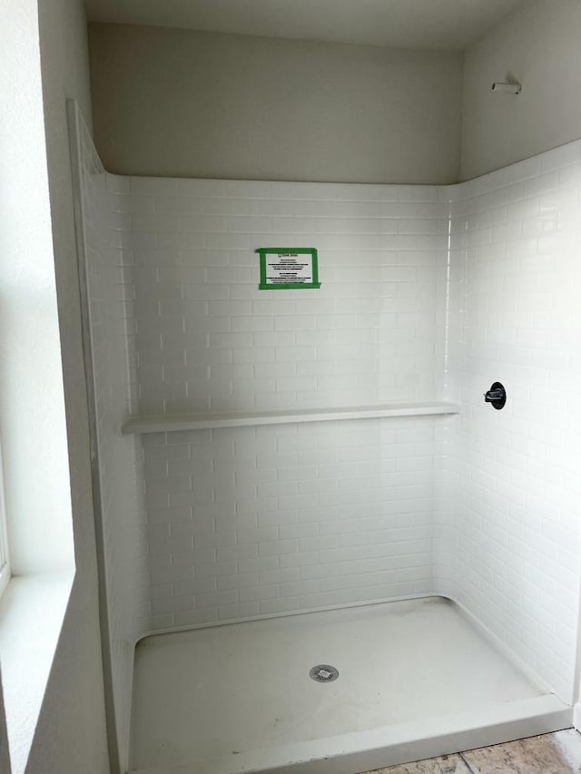 bathroom with walk in shower