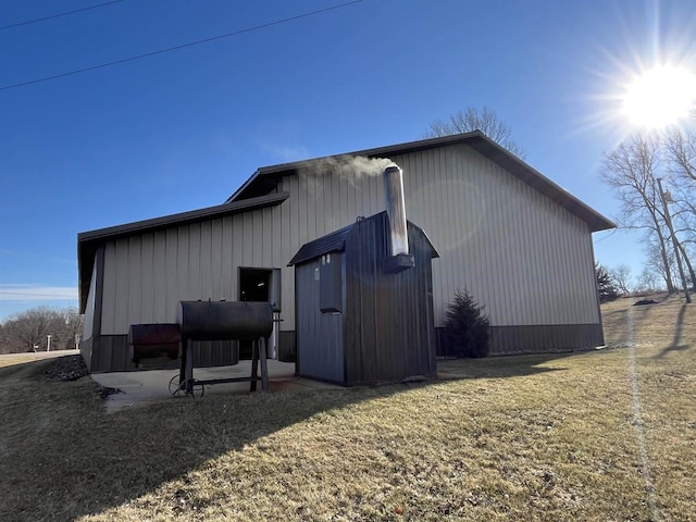 view of property exterior with a lawn