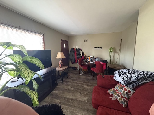 living room with dark hardwood / wood-style floors