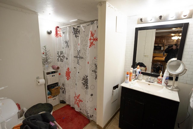 bathroom with vanity and a shower with shower curtain