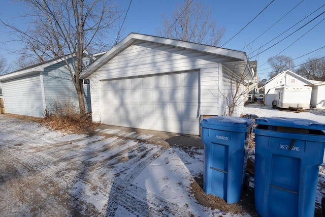 view of snow covered garage