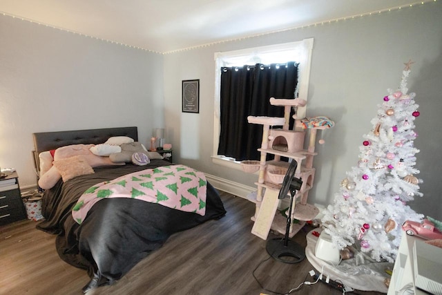 bedroom featuring dark hardwood / wood-style floors