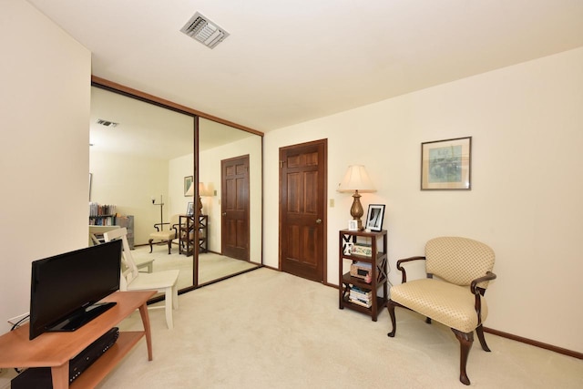 sitting room with light carpet