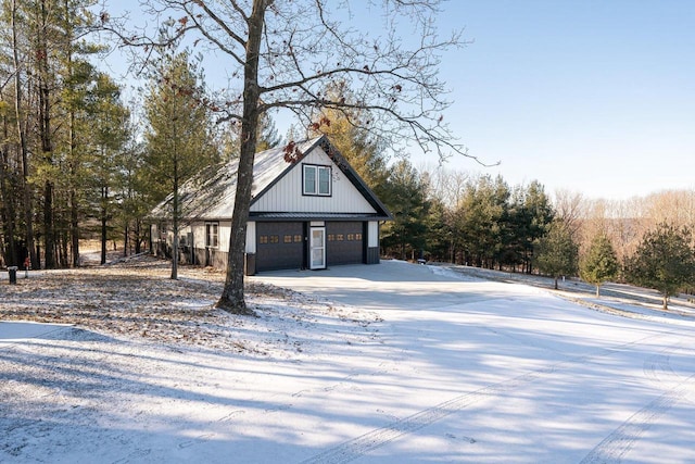 view of snow covered garage