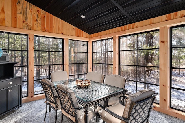 sunroom / solarium with lofted ceiling