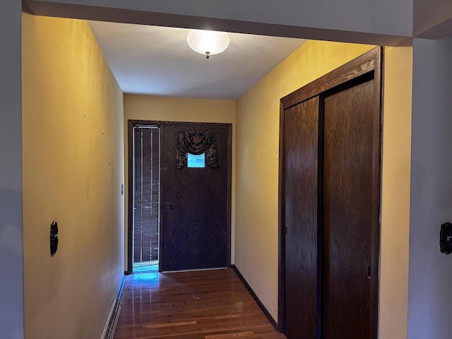 hallway featuring dark hardwood / wood-style floors