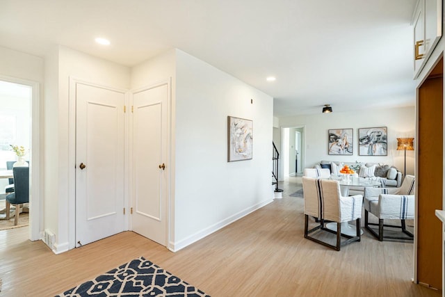 corridor featuring light hardwood / wood-style floors