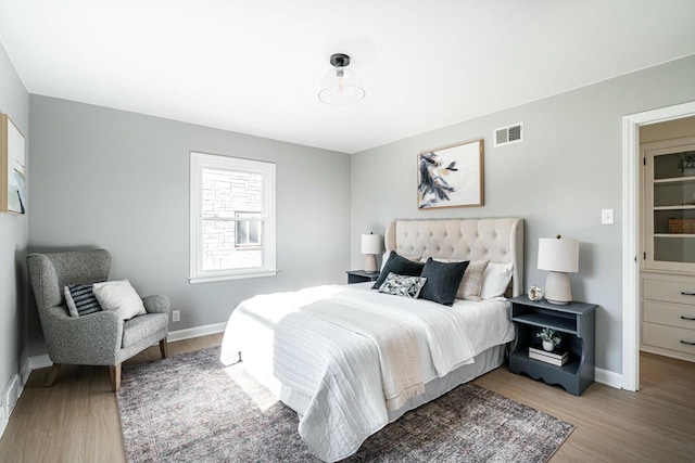 bedroom featuring hardwood / wood-style flooring