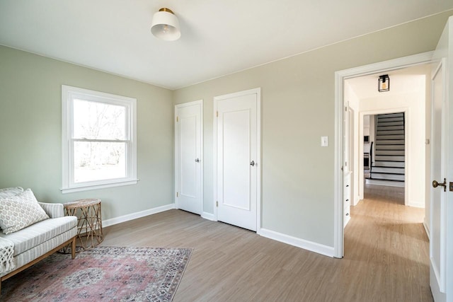 unfurnished room featuring light hardwood / wood-style floors