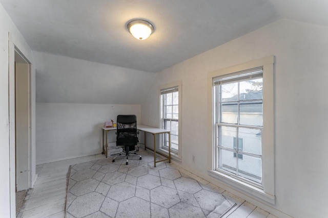 office area with lofted ceiling