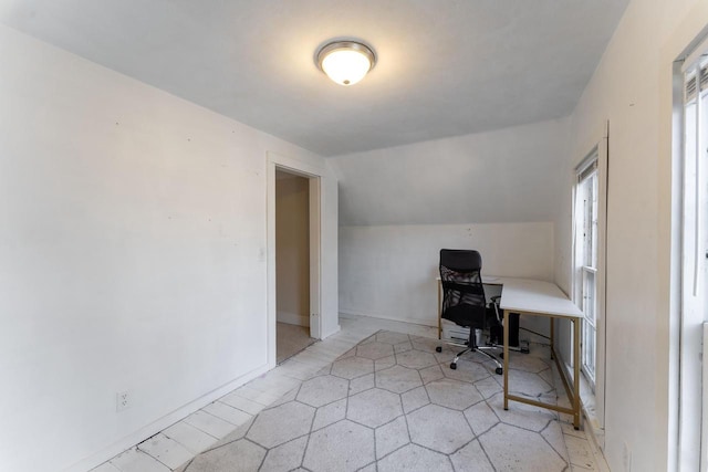 home office with vaulted ceiling