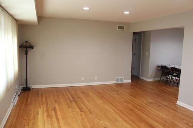 empty room with light wood-type flooring