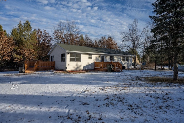 view of front of house featuring a wooden deck