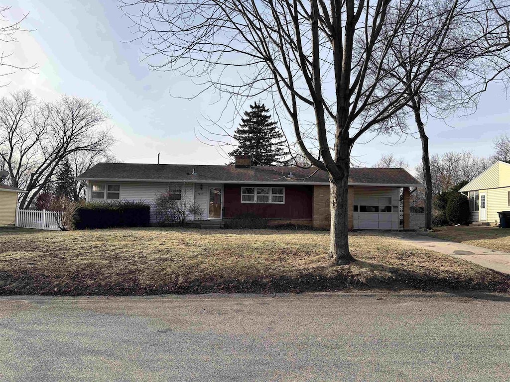 ranch-style home with a garage