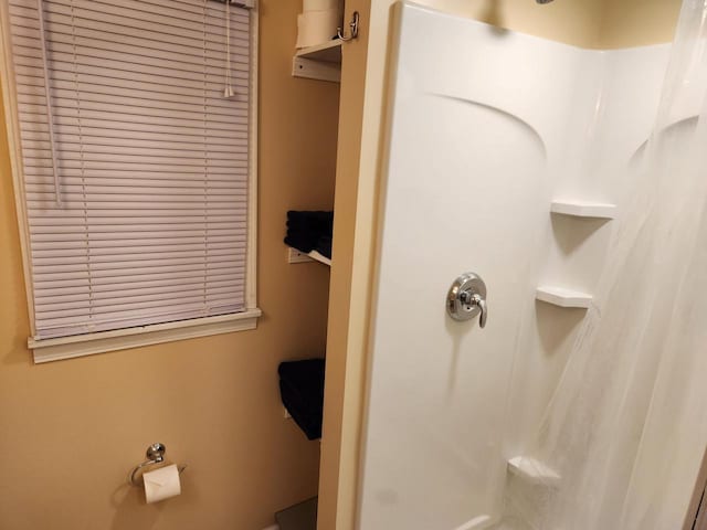 bathroom with walk in shower