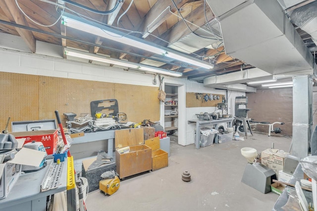 basement with a workshop area