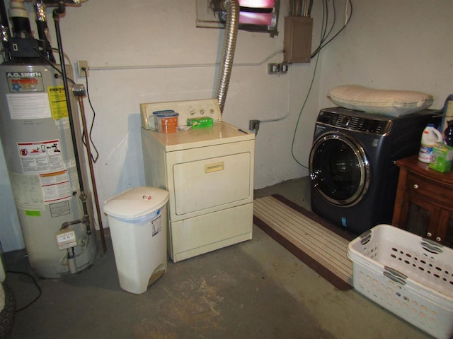 laundry area featuring water heater and independent washer and dryer