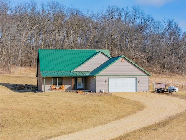 view of front facade with a front lawn and a garage