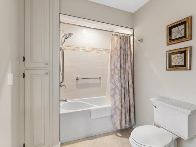 bathroom featuring toilet and shower / tub combo with curtain