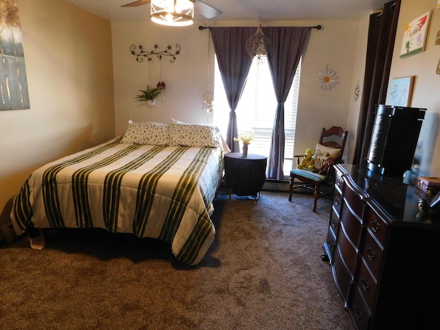 carpeted bedroom featuring ceiling fan