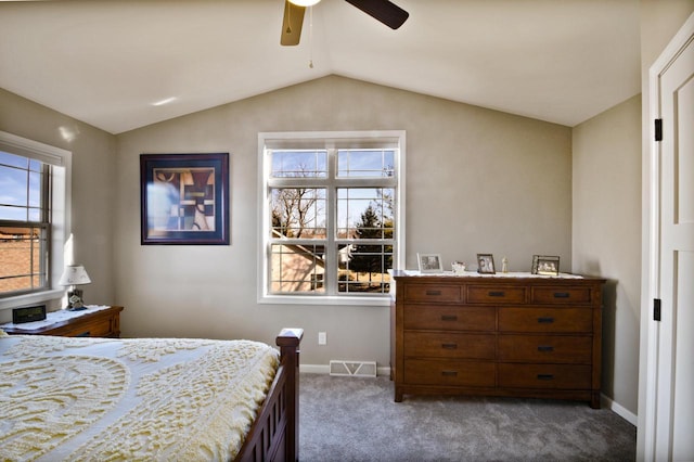 carpeted bedroom featuring ceiling fan and lofted ceiling