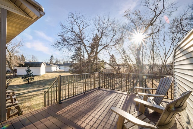 wooden deck with a yard