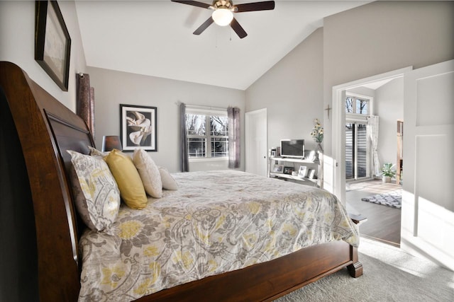 bedroom featuring ceiling fan, lofted ceiling, and hardwood / wood-style flooring