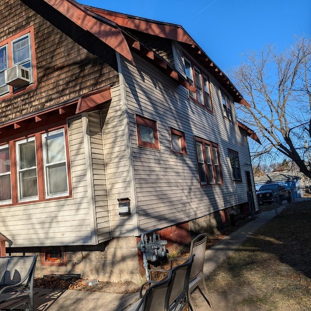 view of home's exterior featuring cooling unit