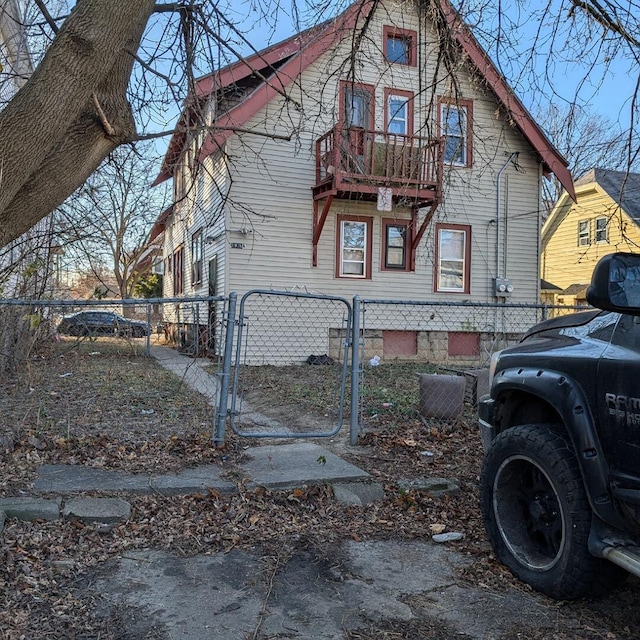 view of home's exterior featuring a balcony