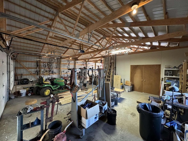 garage with a workshop area