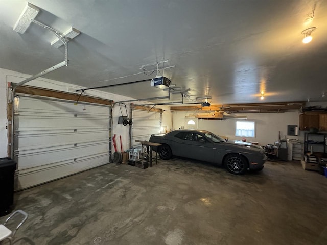 garage featuring a garage door opener