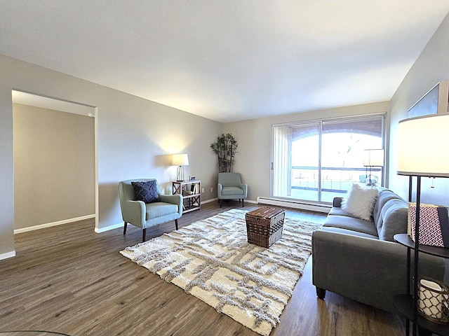 living room featuring a baseboard radiator and dark hardwood / wood-style flooring