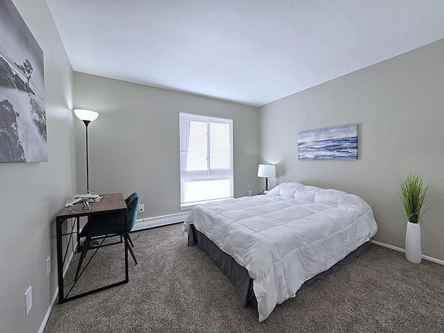 carpeted bedroom with a baseboard heating unit