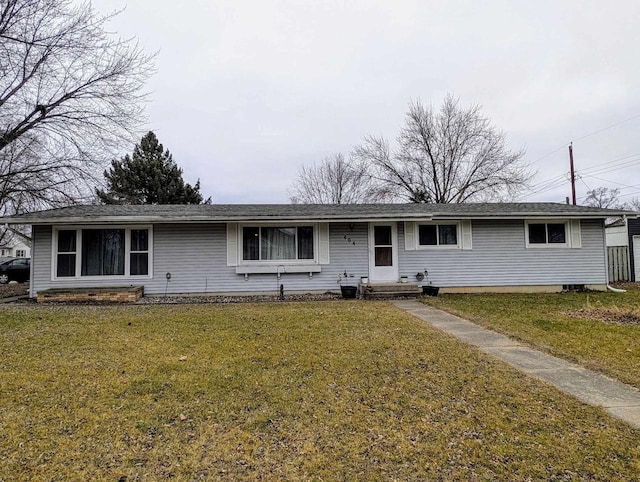 single story home with a front lawn