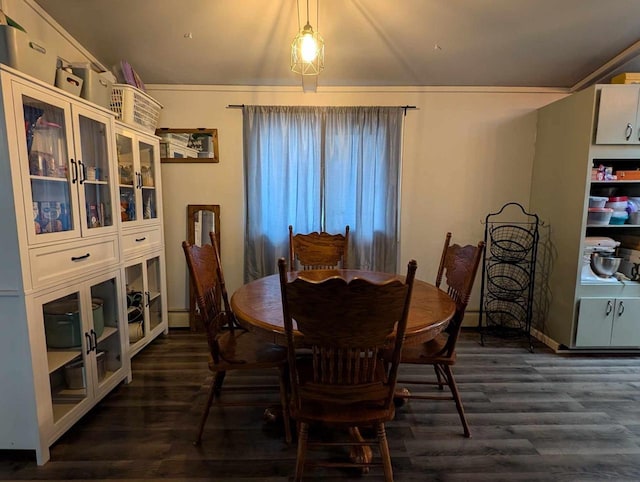 dining space featuring dark hardwood / wood-style floors