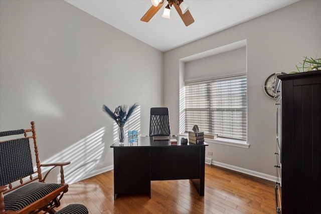 office space with ceiling fan and hardwood / wood-style floors